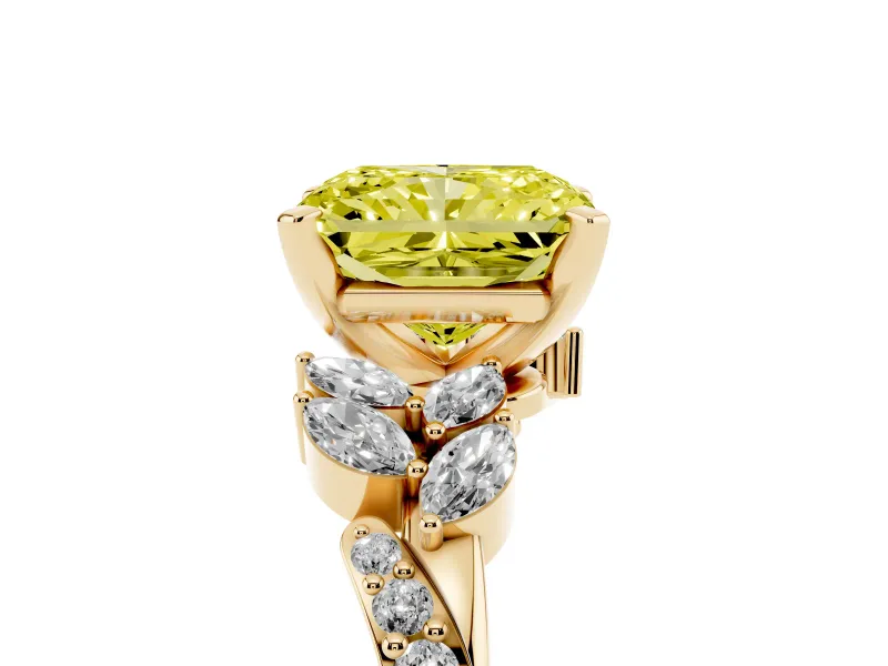 Fancy Yellow Radiant Cut Diamond Solitaire Ring Set in Yellow gold with Marquise Twist Band and Prong Setting