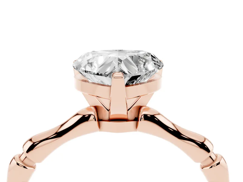 Heart Cut Diamond Solitaire Ring Set in Rose gold with Bamboo Band and Prong Setting