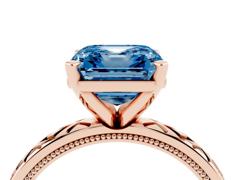 Fancy Blue Asscher Cut Diamond Solitaire Ring Set in Rose gold with Milgrain and Black Enamel X Pattern Band