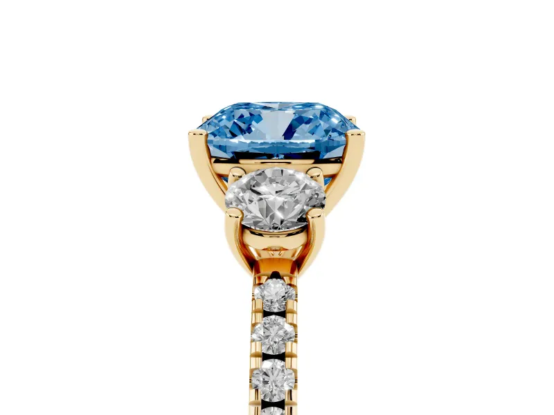 Cushion Cut Three Stone Engagement Ring Setting for a Fancy Blue Lab-Grown Diamond | Pave Shoulders | Yellow Gold