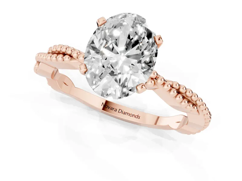 Oval Cut Diamond Solitaire Ring Set in Rose gold with Twisted Band and Bead Prong Setting