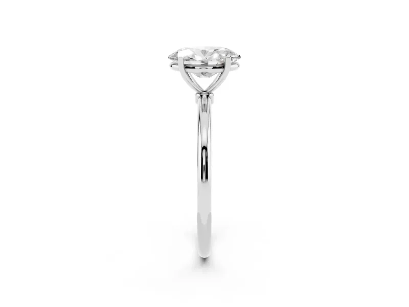 Oval Cut Diamond Solitaire Engagement Ring Set in Platinum with Thin Band and Prong Setting