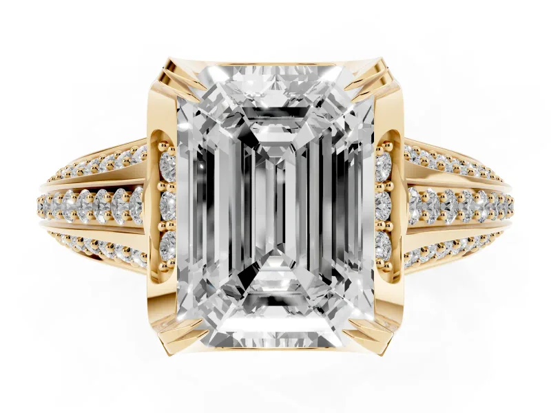 Emerald Cut Diamond Pavé Split Shank Solitaire Ring Set in Yellow gold with Prong Setting