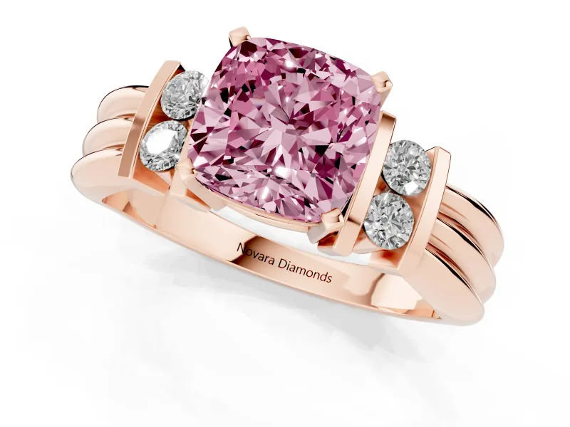 Fancy Pink Three-Stone Cushion Cut Diamond Channel Set Ring Set in Rose gold with Bar Prongs