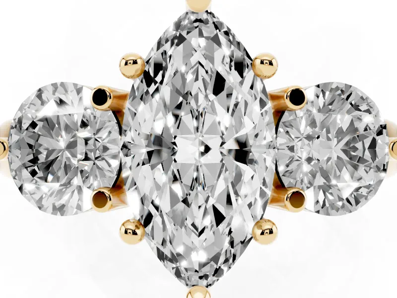 Marquise Cut Diamond Three-Stone Ring Set in Yellow gold with Prong Setting and Classic Band