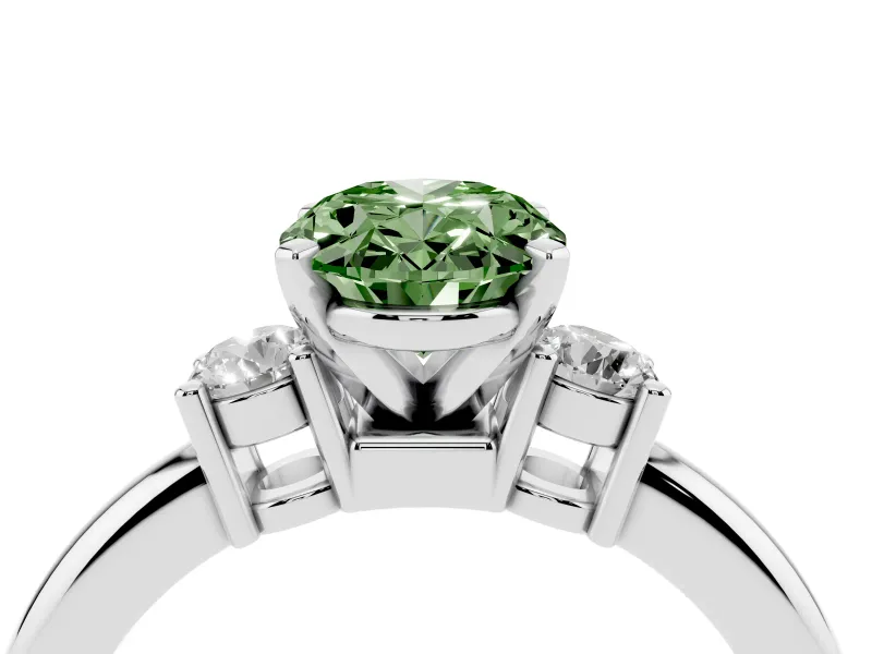 Fancy Green Three-Stone Oval Cut Diamond Ring Set in Platinum with Prong Setting and Plain Band