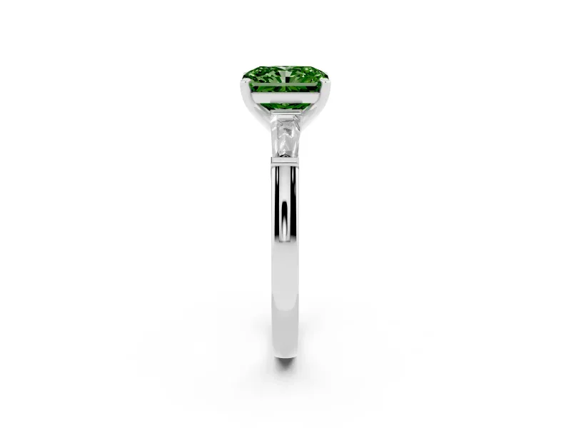 Fancy Green Radiant Cut Diamond Solitaire Ring Set in White gold with Tapered Baguette Side Stones and Prong Setting
