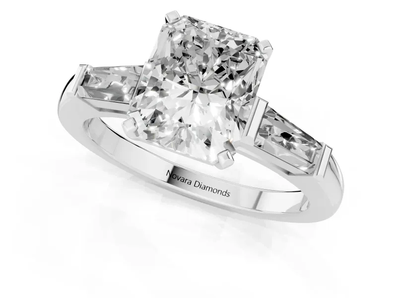 Radiant Cut Diamond Solitaire Ring Set in White gold with Tapered Baguette Side Stones and Prong Setting