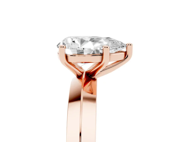 Pear Cut Diamond Solitaire Engagement Ring Set in Rose gold with Flat Band and Prong Setting