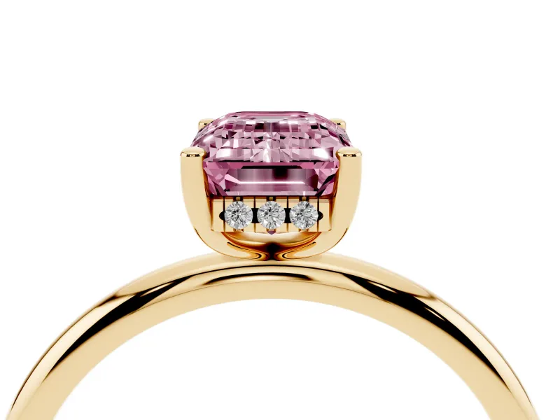 Fancy Pink Emerald Cut Diamond Solitaire Engagement Ring Set in Yellow gold with Prong Setting and Polished Band