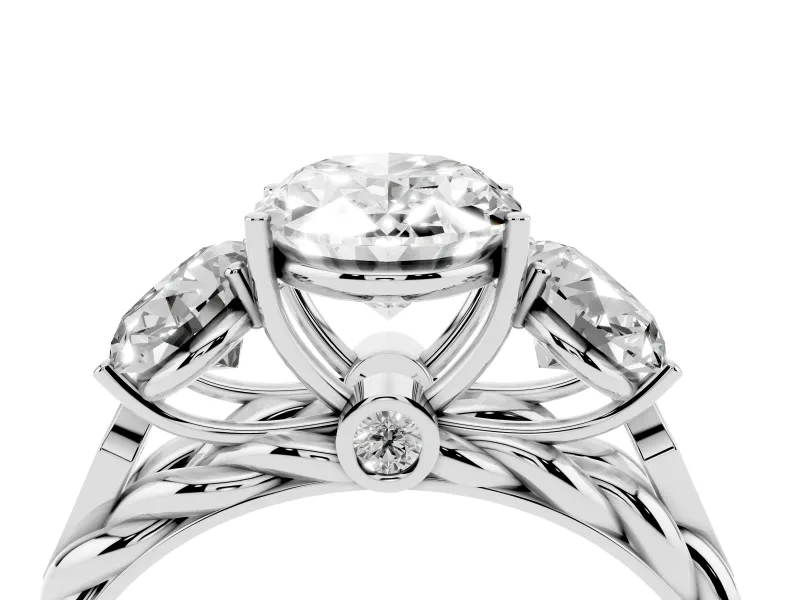 Oval Cut Diamond Three-Stone Ring Set in White gold with Braided Band