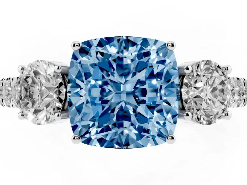 Fancy Blue Cushion Cut Diamond Three-Stone Ring Set in Silver with Round Side Stones and Delicate Pavé Band