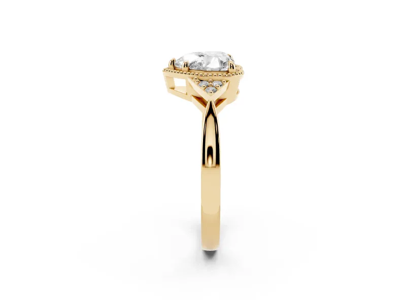 Heart Cut Diamond Milgrain Solitaire Ring Set in Yellow gold with Tapered Pavé Band and Prong Setting
