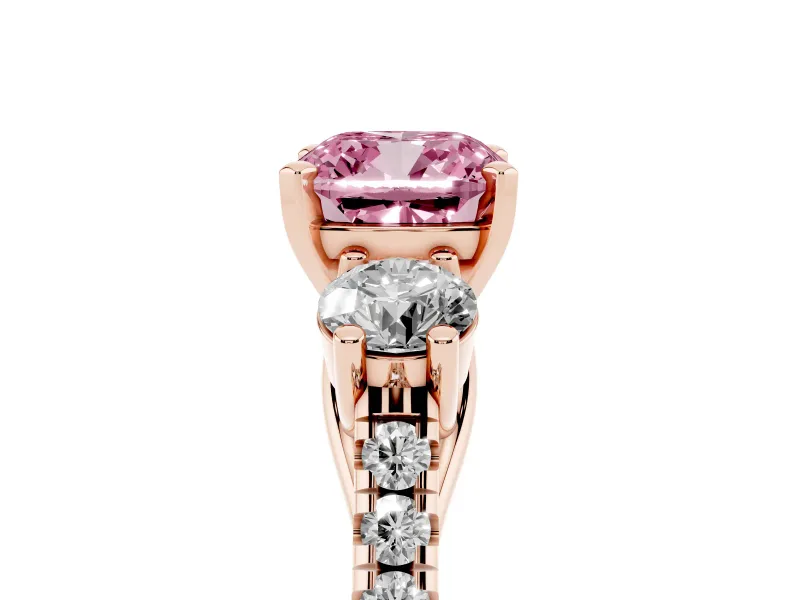 Fancy Pink Three-Stone Cushion Cut Diamond Pavé Band Ring Set in Rose gold with Prong-Set Trio