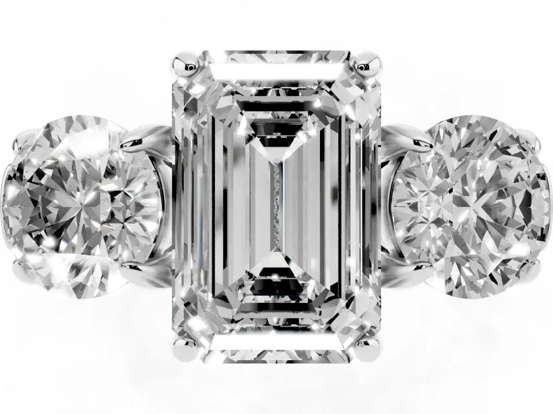 Emerald Cut Diamond Three-Stone Ring Set in White gold with Round Accent Stones and Plain Band