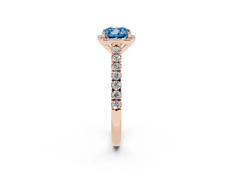 Fancy Blue Cushion Cut Diamond Halo Engagement Ring Set in Rose gold with Pavé Band and Prong Setting
