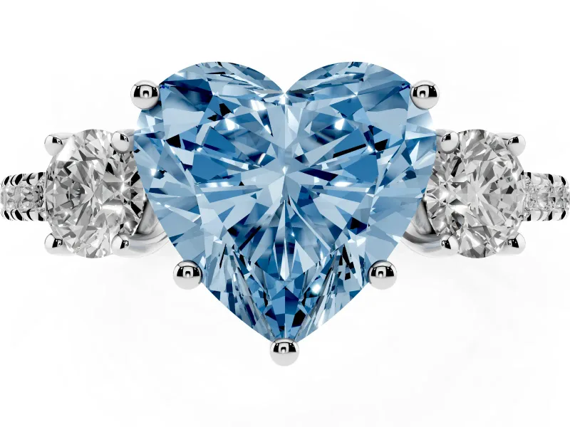 Fancy Blue Heart Cut Diamond Three-Stone Ring Set in Platinum with Pavé Band and Graduated Sides