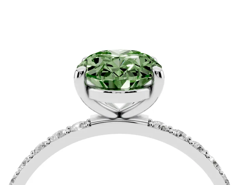 Fancy Green Oval Cut Diamond Solitaire Ring Set in Platinum with Round Pavé Band and Prong Setting