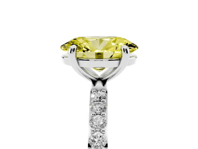 Fancy Yellow Oval Cut Diamond Solitaire Ring Set in Platinum with Round Pavé Band and Prong Setting