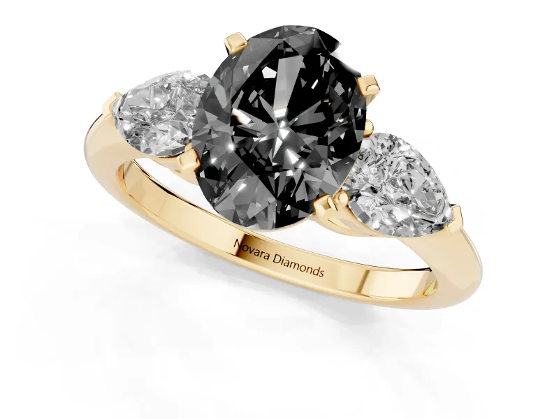 Oval Three-Stone Engagement Ring Setting for a Black Center | Pear Side Stones | Yellow Gold