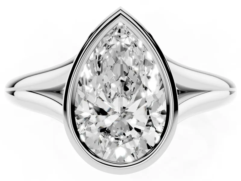 Bezel Set Pear Cut Diamond Solitaire Ring Set in White gold with Tapered Band
