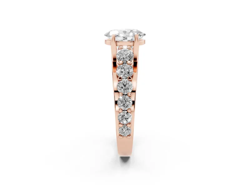 Oval Graduated Side Stone Engagement Ring Setting | Shared Prong Rails | Rose Gold