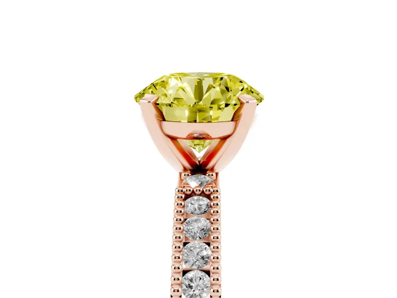 Fancy Yellow Round Cut Diamond Solitaire Ring Set in Rose gold with Slim Pavé Band and Prong Setting
