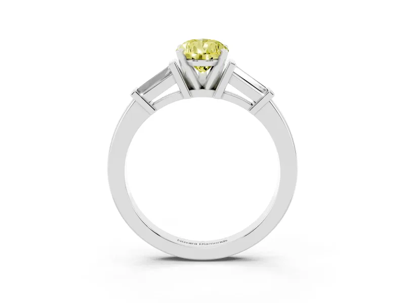 Fancy Yellow Pear Cut Diamond Solitaire Ring Set in Platinum with Tapered Baguette Accents and Prong Setting