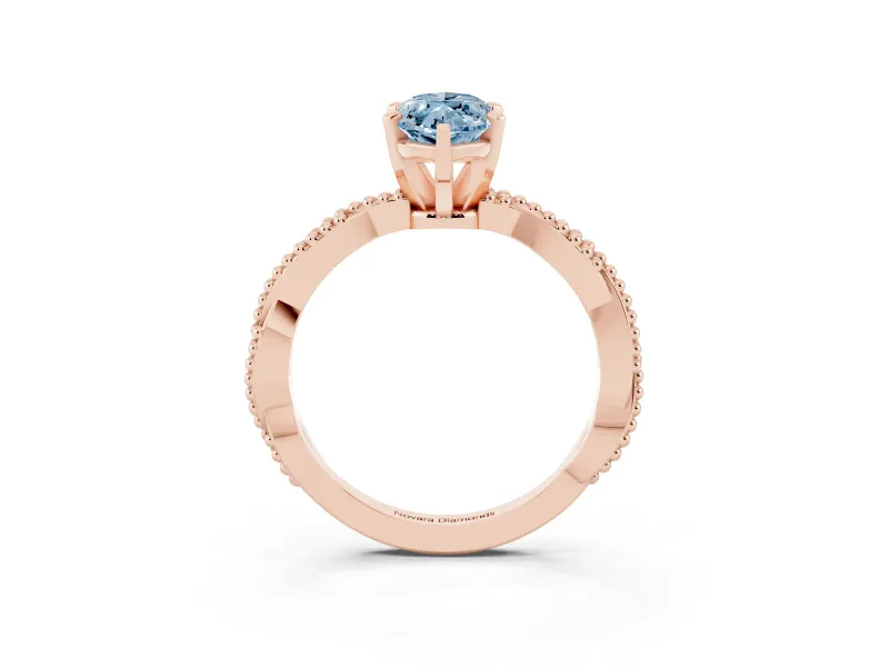 Fancy Blue Marquise Cut Diamond Solitaire Ring Set in Rose gold with Twisted Band and Bead Prong Setting