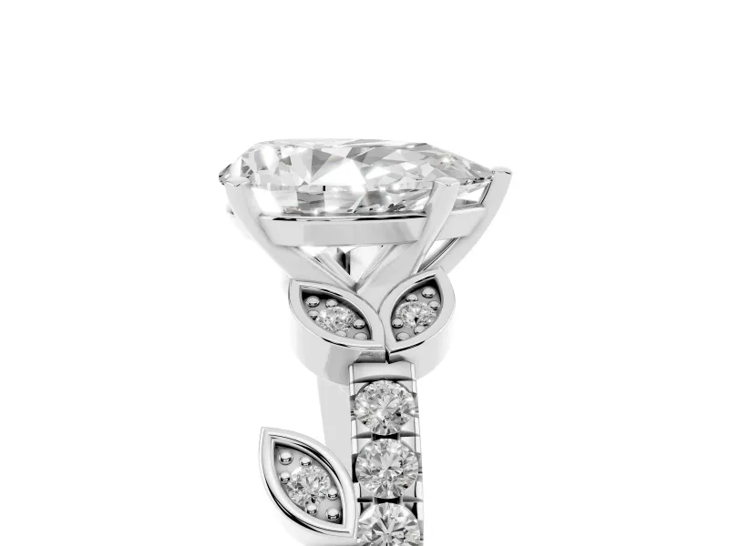 Pear Cut Diamond Solitaire Leaf-Inspired Ring Set in Platinum with Pavé Band and Prong Setting