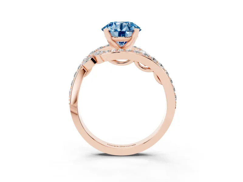 Fancy Blue Round Cut Diamond Solitaire Ring Set in Rose gold with Pavé Twist Band and Secure Prong Setting