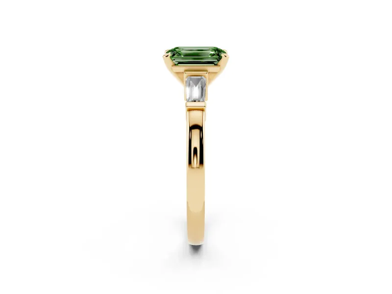 Fancy Green Emerald Cut Diamond Solitaire Ring Set in Yellow gold with Tapered Baguette Accents and Prong Setting