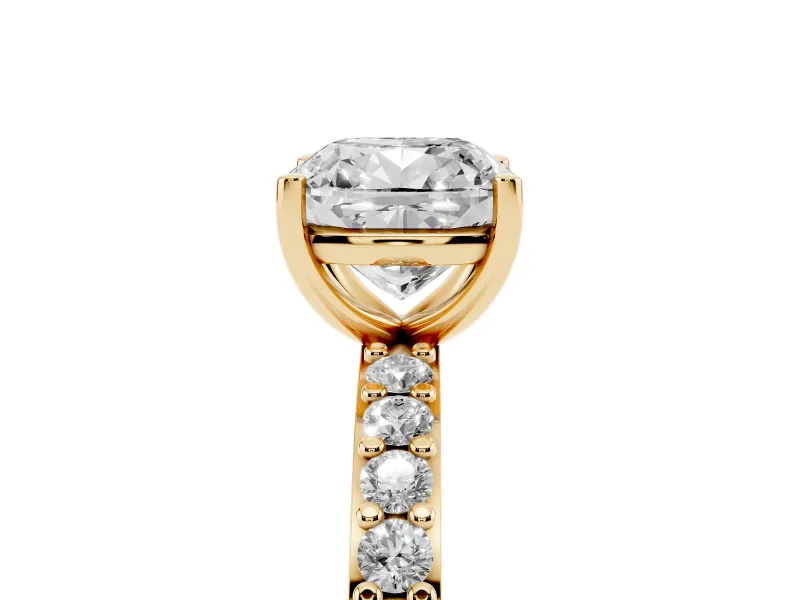 Cushion Cut Diamond Solitaire Set in Yellow gold with Round Pavé Band and Prong Setting