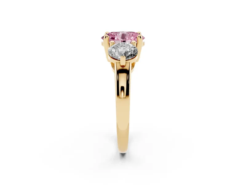 Fancy Pink Oval Cut Diamond Three-Stone Ring Set in Yellow gold with Prong Setting and Classic Band