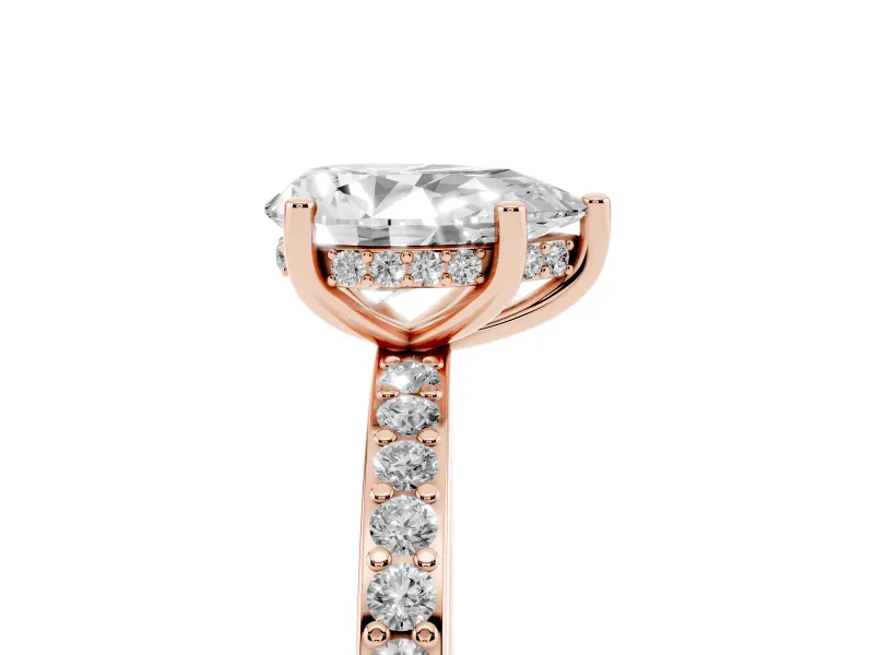 Pear Cut Diamond Pavé Band Ring Set in Rose gold with Prong-Set Center Stone