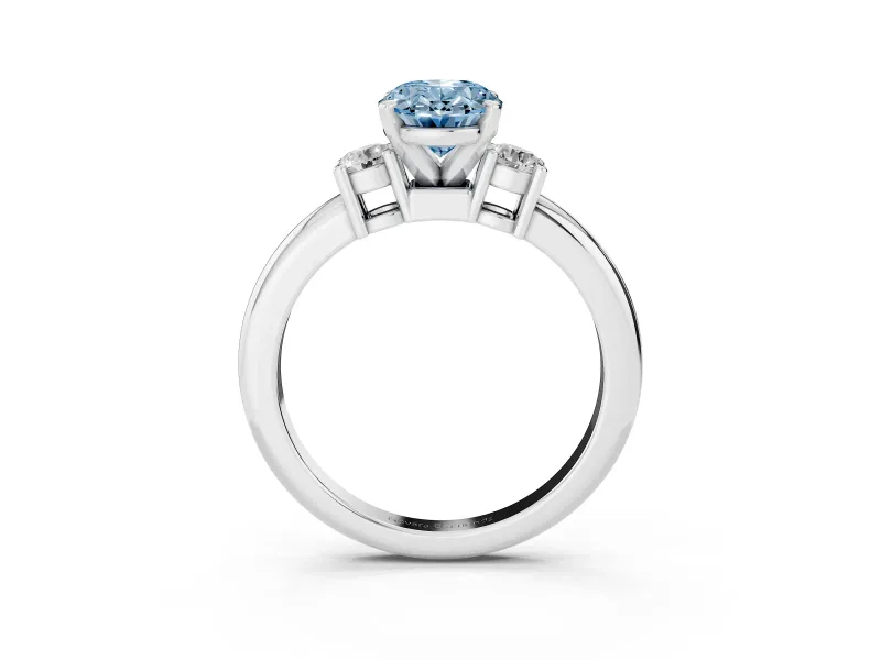 Fancy Blue Three-Stone Oval Cut Diamond Ring Set in Platinum with Prong Setting and Plain Band