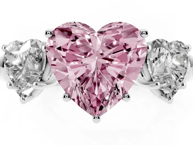 Fancy Pink Heart Cut Diamond Three-Stone Ring Set in Platinum with Bold Center and Classic Band