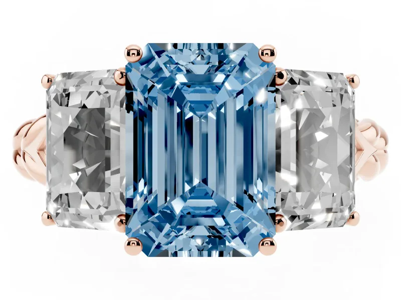 Fancy Blue Emerald Cut Diamond Three-Stone Ring Set in Rose gold with Braided Band
