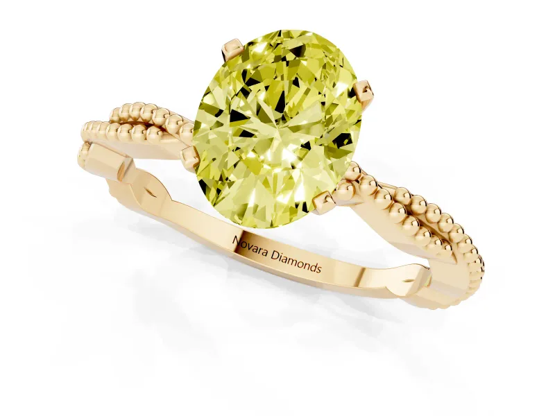 Fancy Yellow Oval Cut Diamond Solitaire Ring Set in Yellow gold with Twisted Band and Bead Prong Setting