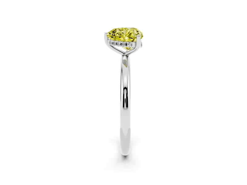 Fancy Yellow Heart Cut Diamond Solitaire Engagement Ring Set in Platinum with Prong Setting and Polished Band