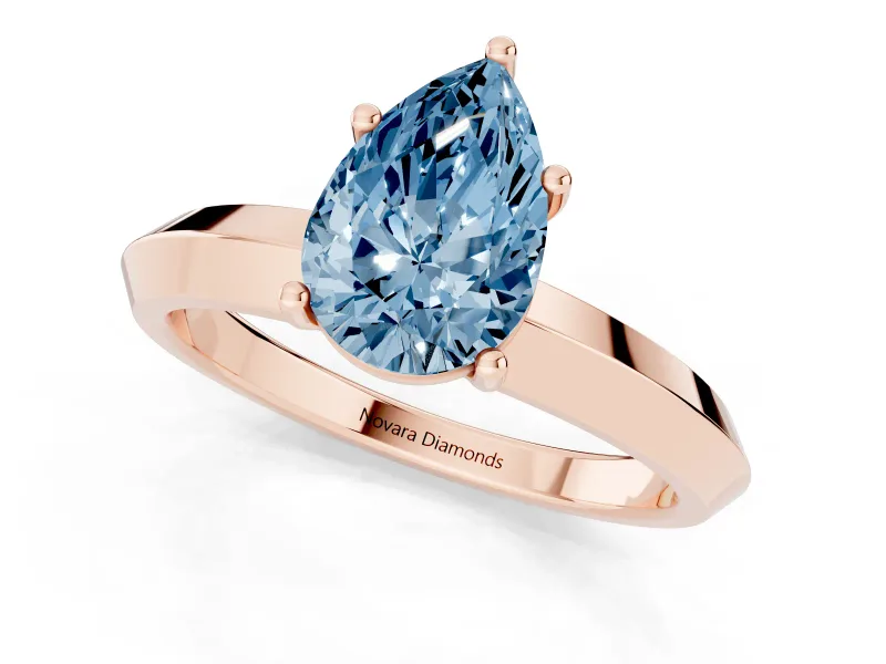 Fancy Blue Pear Cut Diamond Solitaire Engagement Ring Set in Rose gold with Flat Band and Prong Setting