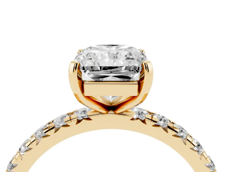 Radiant Cut Diamond Pavé Solitaire Ring Set in Yellow gold with Round Band and Prong Setting