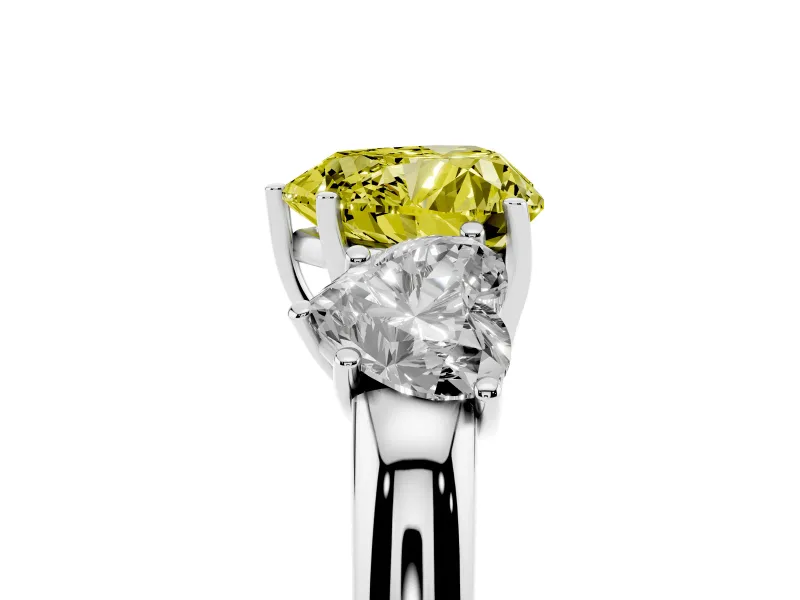 Fancy Yellow Heart Cut Diamond Three-Stone Ring Set in Platinum with Bold Center and Classic Band