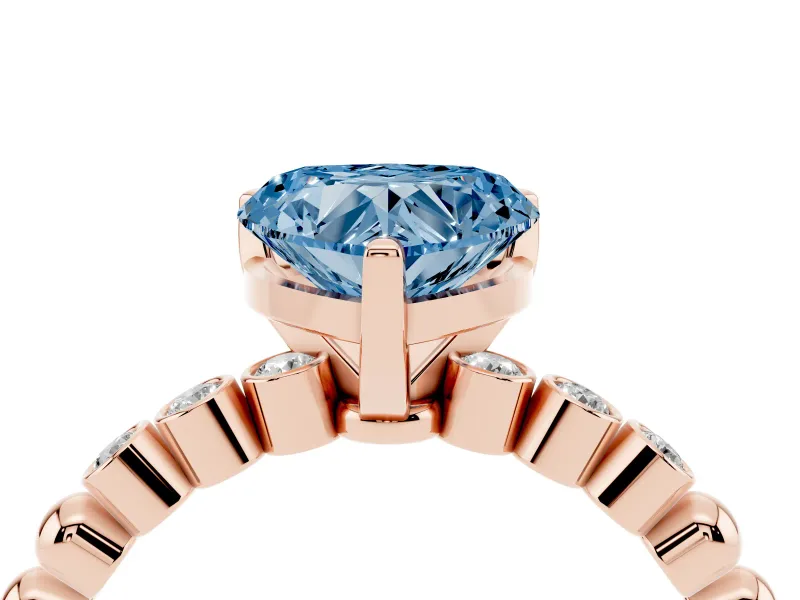 Fancy Blue Heart Cut Diamond Solitaire Engagement Ring Set in Rose gold with Bezel Accents on Beaded Band