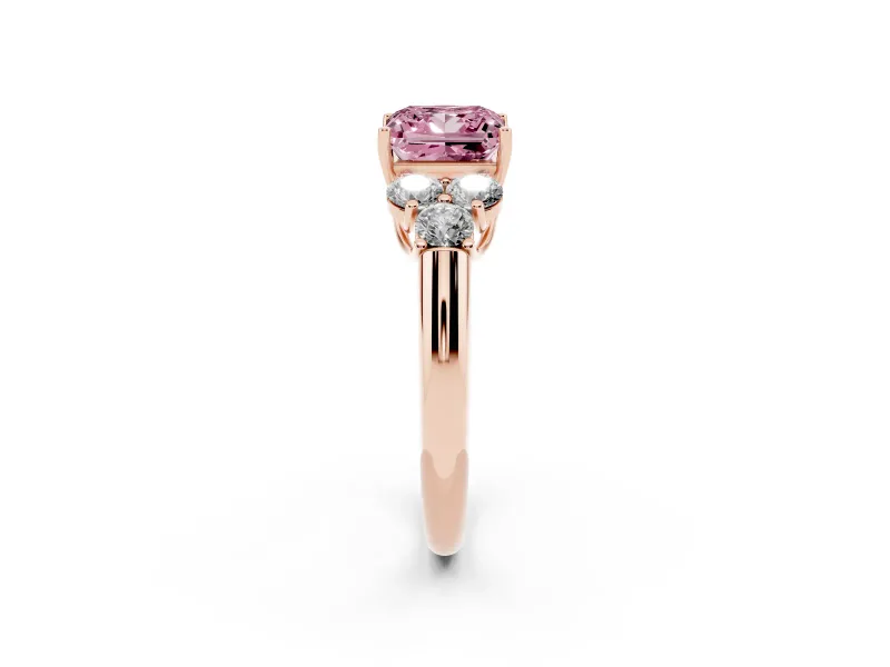 Fancy Pink Princess Cut Diamond Cluster Ring Set in Rose gold with Round Accent Stones and Prong Setting on a Plain Band