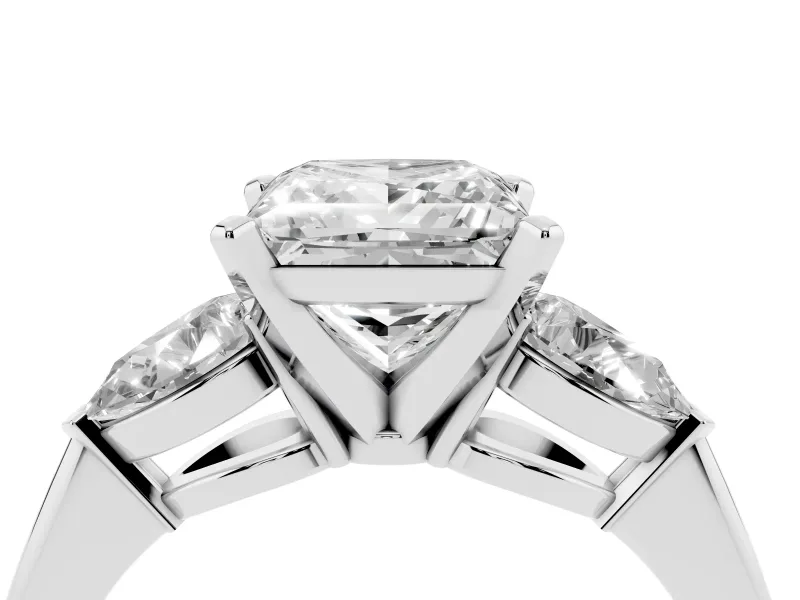 Three-Stone Princess Cut Diamond Ring Set in Platinum with Pear Side Stones and Prong Setting