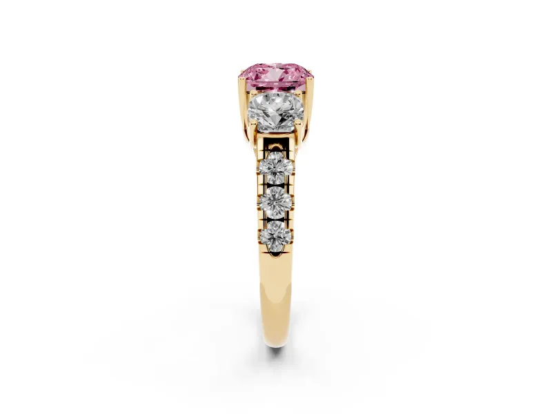 Fancy Pink Cushion Cut Diamond Three-Stone Ring Set in Yellow gold with Pavé Band