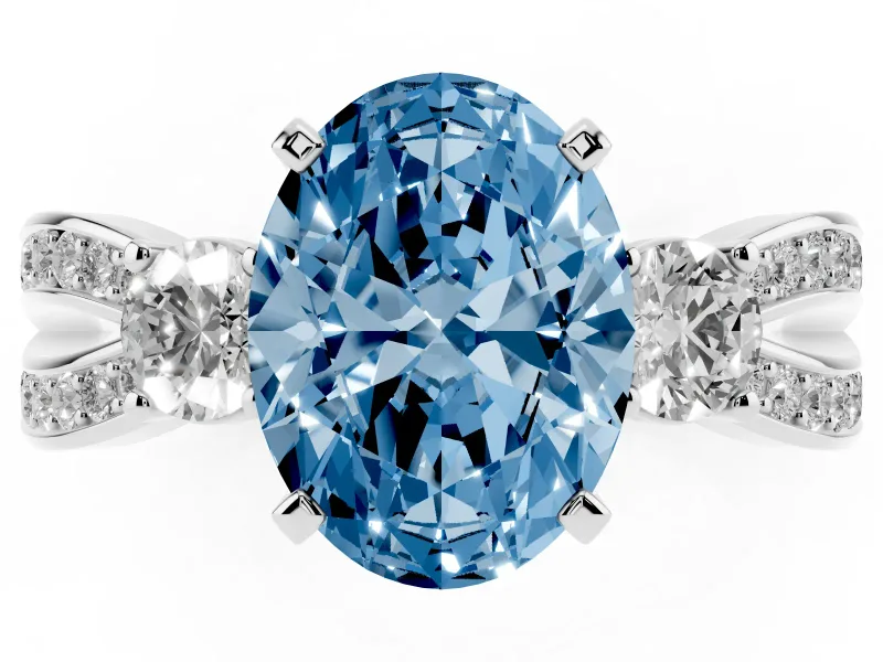 Fancy Blue Three-Stone Oval Cut Diamond Twist Band Ring Set in White gold with Pavé Accents and Prong Setting