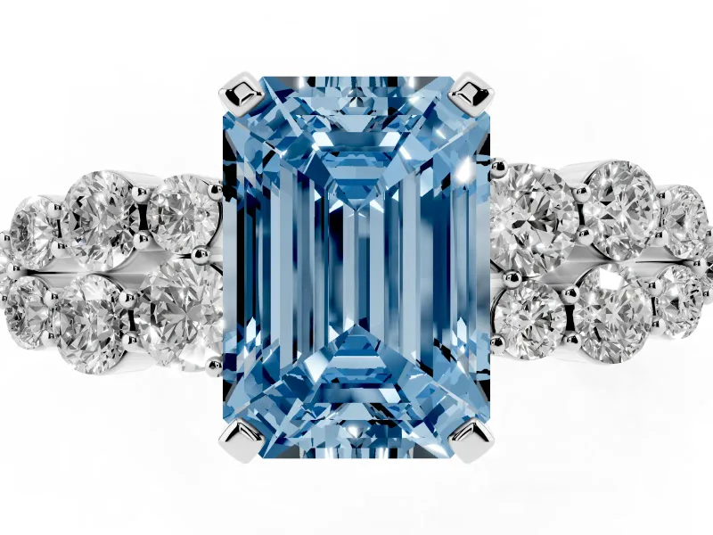 Fancy Blue Emerald Cut Diamond Cluster Engagement Ring Set in Silver with Pavé Band and Prong Setting
