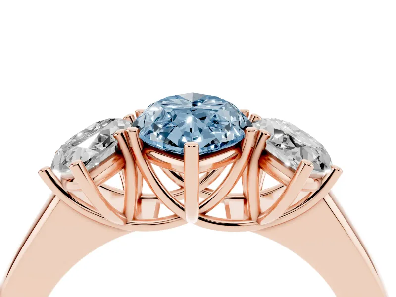 Fancy Blue Three-Stone Marquise Cut Diamond Ring Set in Rose gold with Matching Prong Settings and Plain Band